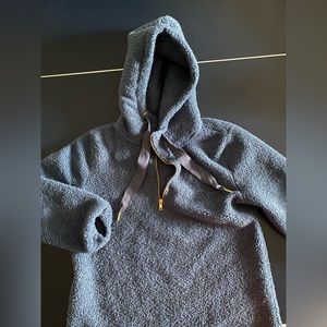 Navy blue loft hoodie with gold accent